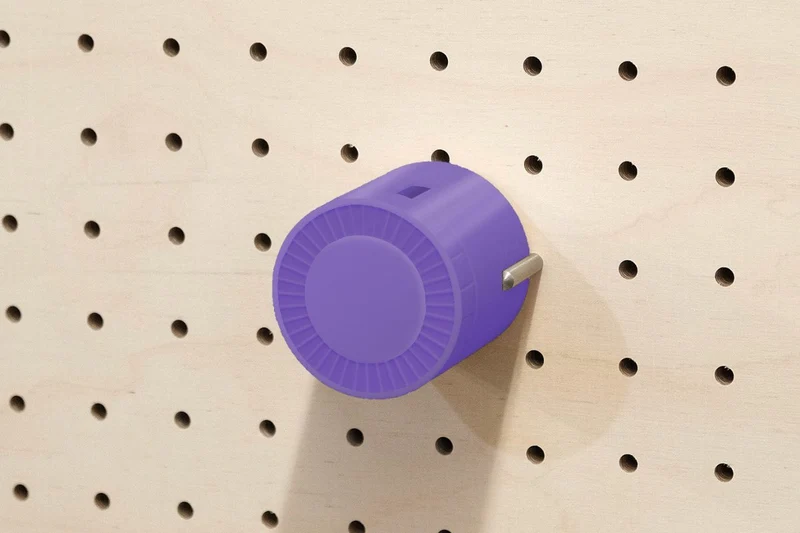 Enrouleur de câble pour pegboard – range-câble mural panneau perforé