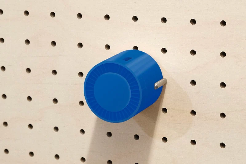 Enrouleur de câble pour pegboard – range-câble mural panneau perforé