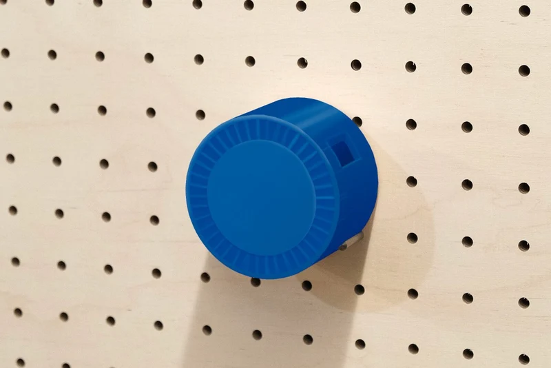 Enrouleur de câble pour pegboard – range-câble mural panneau perforé