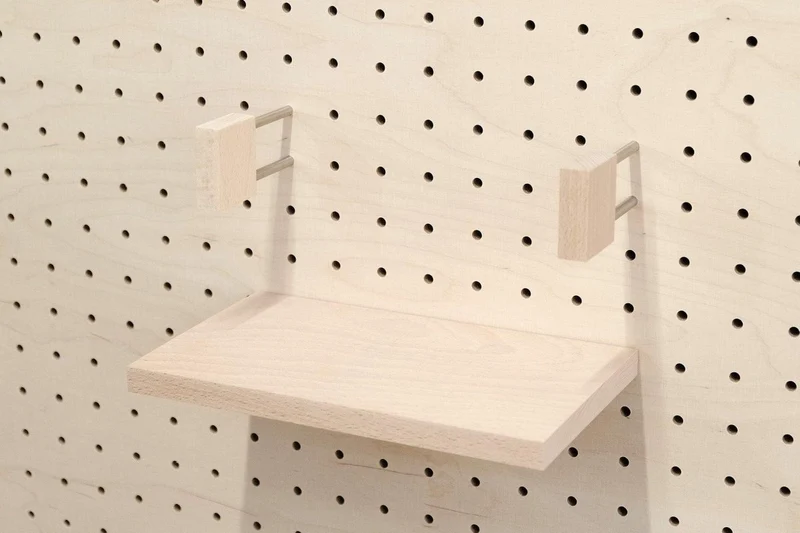 Serre-livres minimaliste pour pegboard – accessoire bibliothèque murale